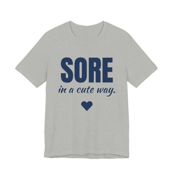 Athletic Heather t-shirt printed in navy blue ink with a heart and the words "Sore in a Cute Way."