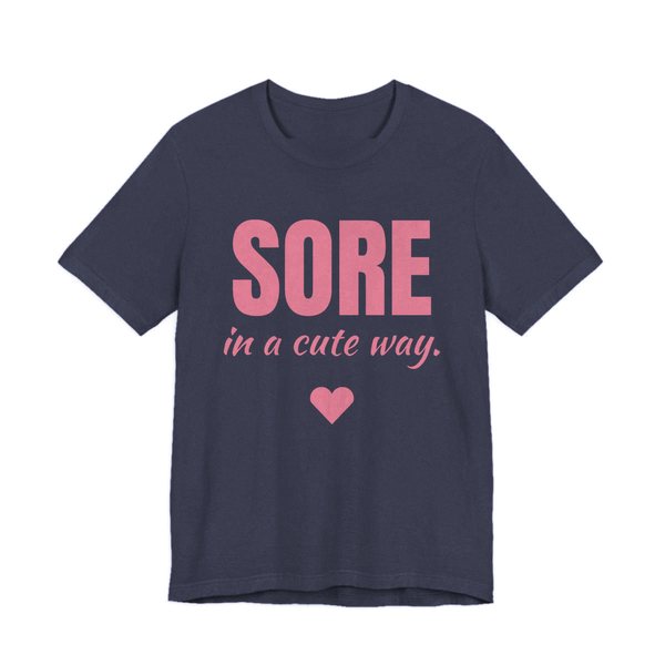 Heather Navy t-shirt printed in rose pink ink with a heart and the words "Sore in a Cute Way."