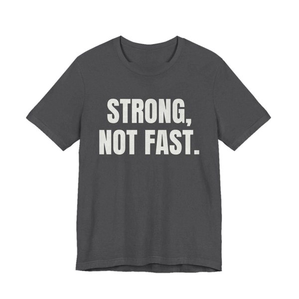 Dark Grey Heather t-shirt printed in off-white ink with the words "Strong, Not Fast."