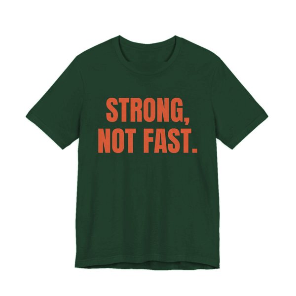 Forest t-shirt printed in orange ink with the words "Strong, Not Fast."