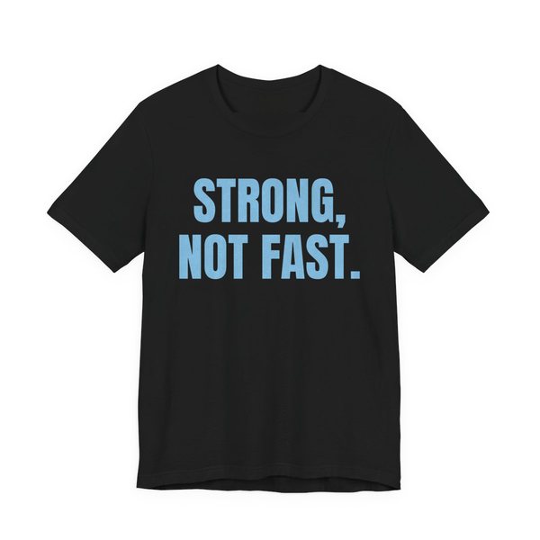 Black t-shirt printed in sky blue ink with the words "Strong, Not Fast."