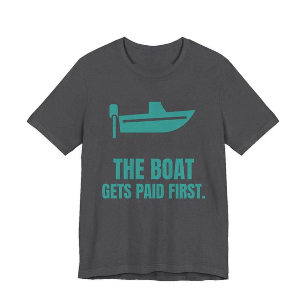 Dark Grey Heather t-shirt printed in teal ink with a boat with an outboard motor and the words “The Boat Gets Paid First.”