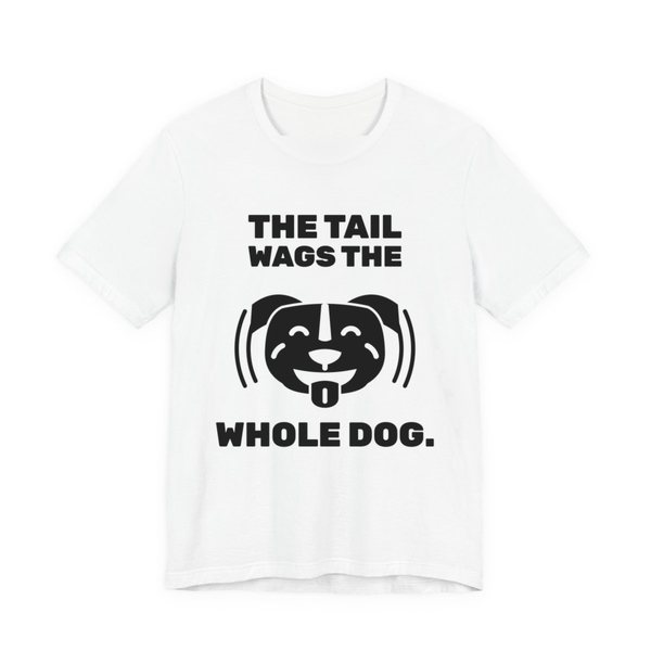 White t-shirt printed in dark ink with a wiggling pit bull face and the words “The Tail Wags the Whole Dog.”