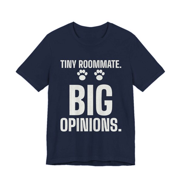 Navy t-shirt printed in off-white ink with paw prints and the words “Tiny Roommate. Big Opinions.”