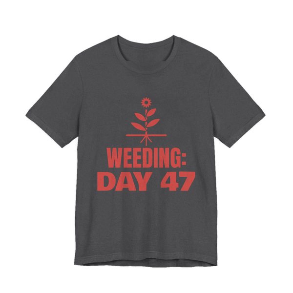 Dark Grey Heather t-shirt printed in tomato red ink with a flowering weed with its roots and the words “Weeding: Day 47”