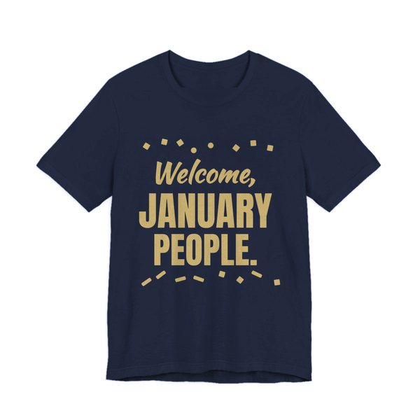 Navy t-shirt printed in champagne gold ink with confetti and the words “Welcome, January People.”