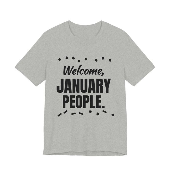 Athletic Heather t-shirt printed in dark ink with confetti and the words “Welcome, January People.”