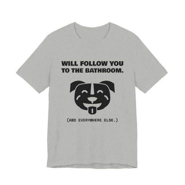 Athletic Heather t-shirt printed in dark ink with a smiling pit bull face and the words “Will Follow You to the Bathroom. (And everywhere else.)”