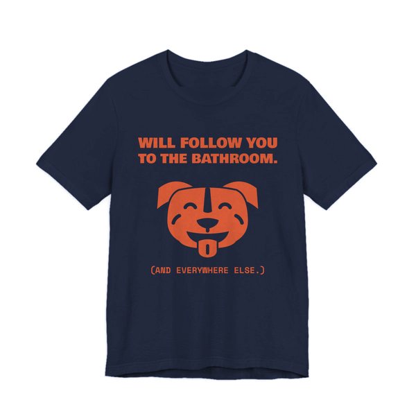 Navy t-shirt printed in orange ink with a smiling pit bull face and the words “Will Follow You to the Bathroom. (And everywhere else.)”